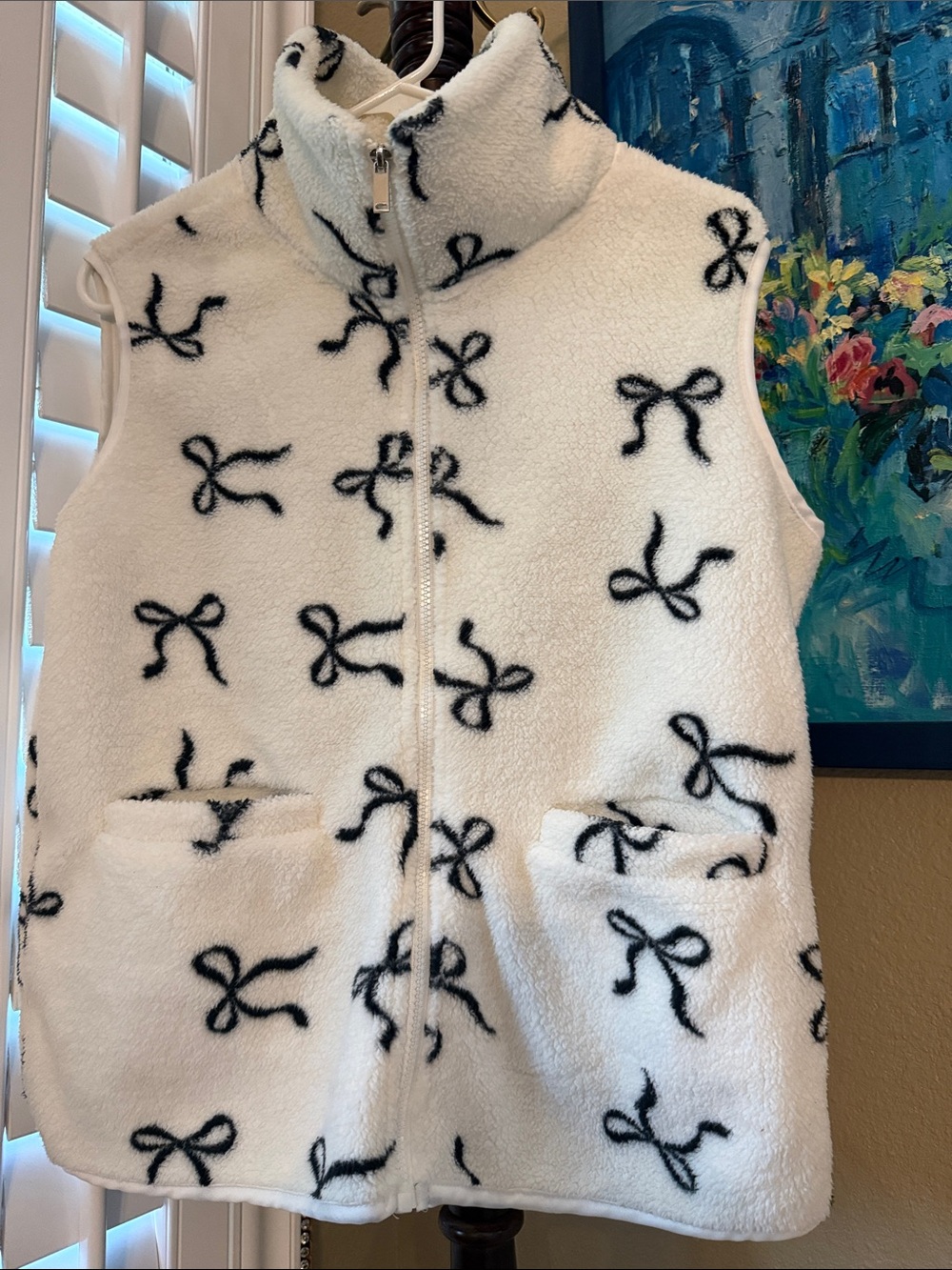 Cozy White Sherpa Vest with Black Bow Print